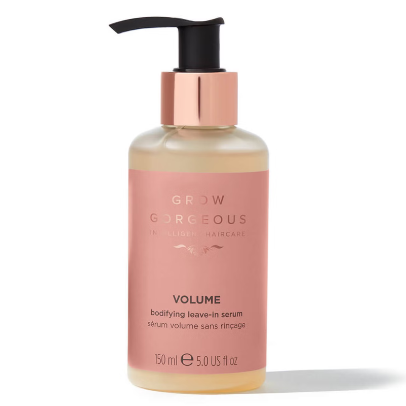 Grow Gorgeous Volume Bodifying Leave-In Serum, 150 ml (5.0 fl oz), designed to enhance hair volume without rinsing, featuring a pink label and a pump dispenser.