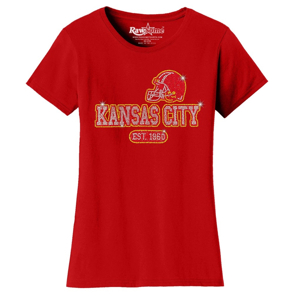Red short-sleeve tee with rhinestone embellishments, featuring a football helmet design, the text \“Kansas City,\“ and \“Est. 1960\“ below.