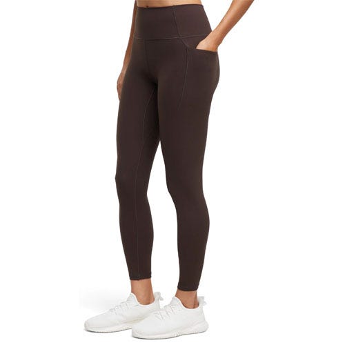 High-waisted, dark brown leggings with side pockets, paired with white sneakers.