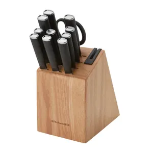 A 12-piece KitchenAid cutlery set with black handles housed in a wooden block, featuring various knives and a sharpener.