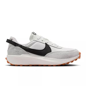White and gray sneaker with a black swoosh and orange sole, featuring a modern retro design.
