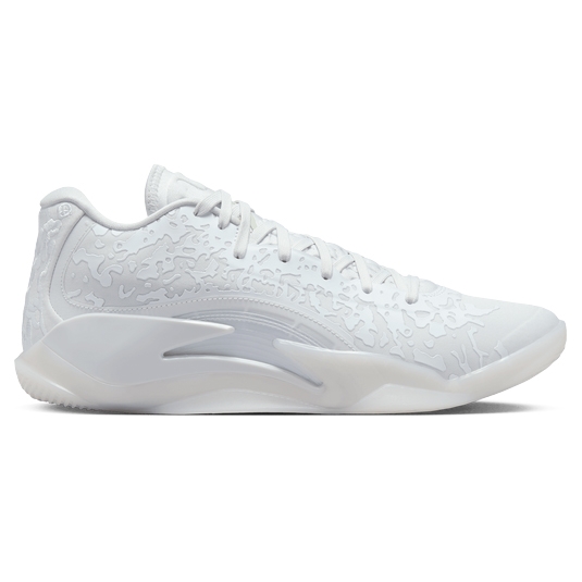 White athletic sneaker with a textured upper design and swooping sole silhouette.