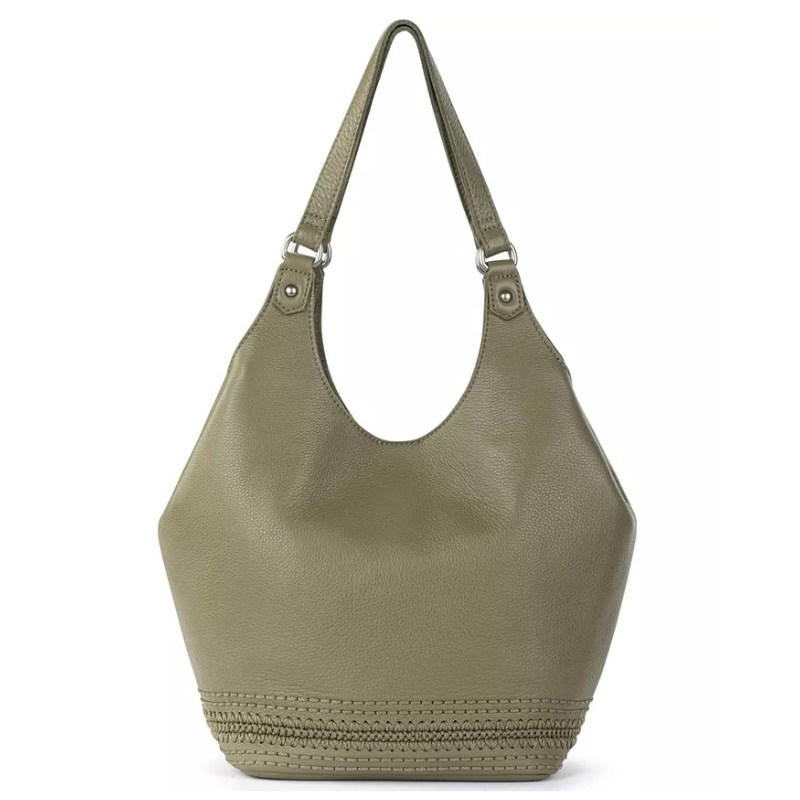 The Sak Roma Shopper Bag is a green leather handbag with two handles and a woven detail at the bottom. It features a spacious interior, ideal for daily use.