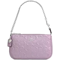 A light purple Coach handbag with an embossed logo pattern, featuring a silver chain strap and a small attached tag.