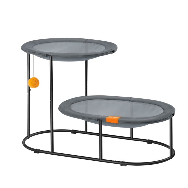 Two-tiered cat perch with a metal frame, featuring trampoline-style mesh surfaces, an inviting orange accent, and a hanging pom-pom toy.