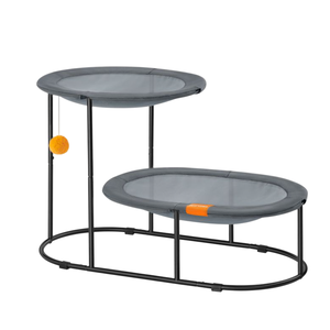 Two-tiered cat perch with a metal frame, featuring trampoline-style mesh surfaces, an inviting orange accent, and a hanging pom-pom toy.