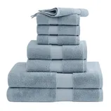 A stack of light blue towels is neatly arranged, featuring various sizes, including washcloths, hand towels, and bath towels.