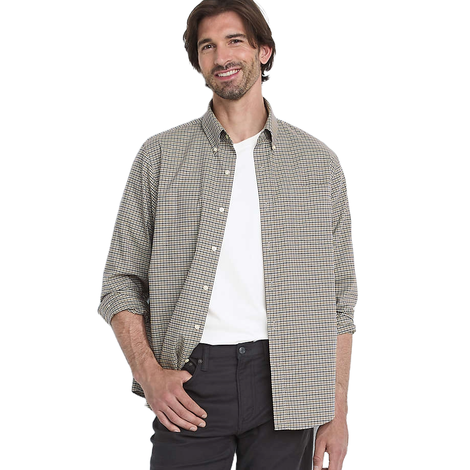 A man is wearing a checkered button-up shirt over a white t-shirt with black pants.