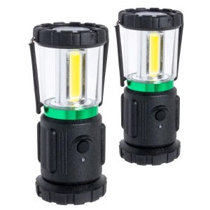 Two black and green LED mini-lanterns with a cylindrical transparent top, showing a vertical LED strip inside. Each lantern has a carrying handle and a button on the base for operation.