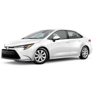 A white Toyota Corolla sedan.