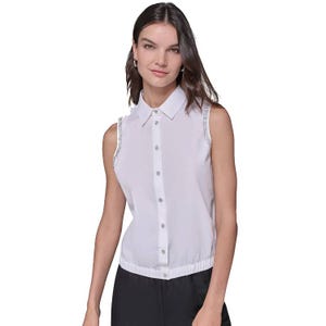 Sleeveless white button-up top featuring a collar, embellished trims on the shoulders, and an elastic hem.