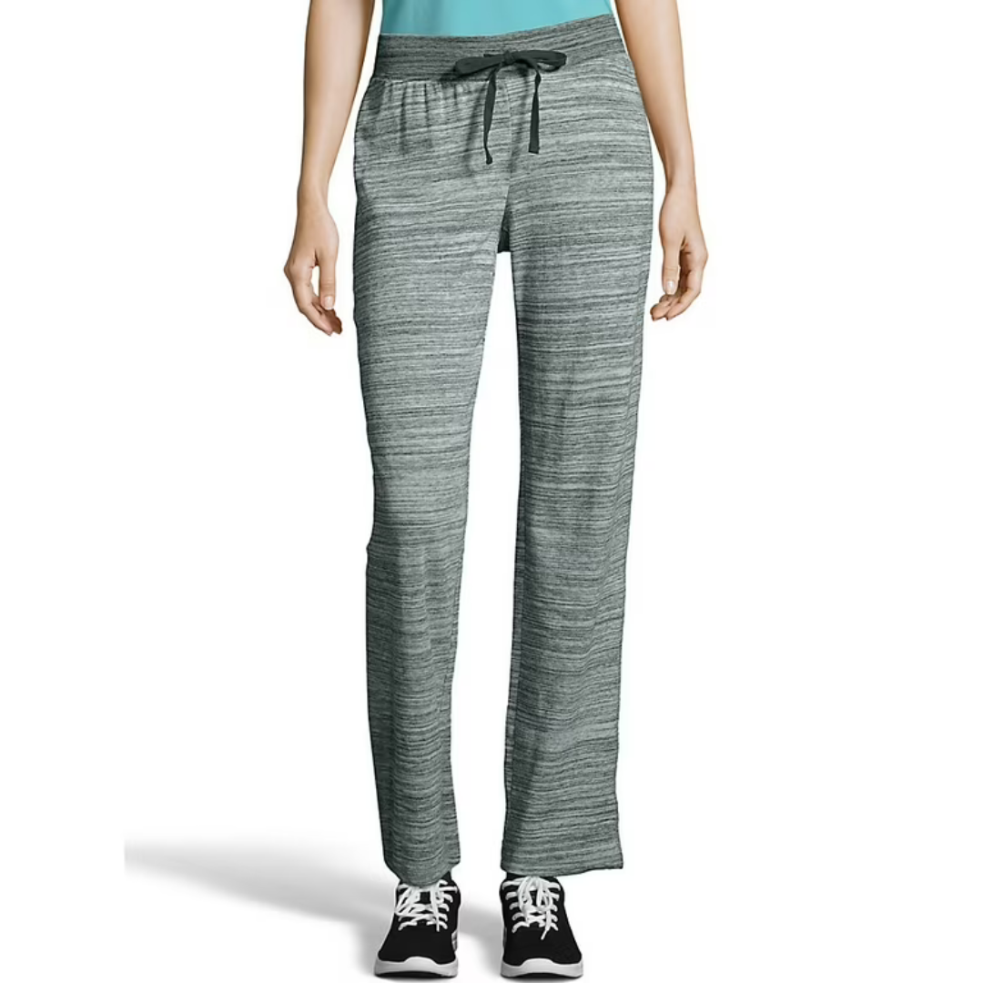 Gray drawstring lounge pants with a heathered texture, paired with black sneakers.