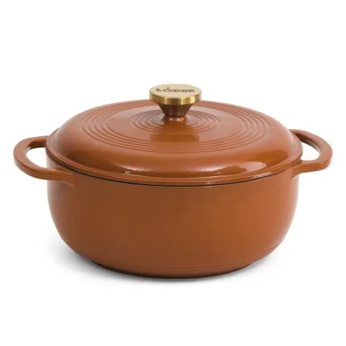 A round, brown enameled cast iron Dutch oven with a lid and side handles, featuring a gold knob on top.