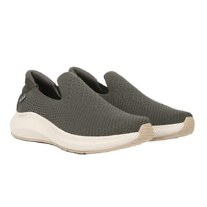 Ryka Cushioned Slip-Ons feature a knitted olive green upper, a white supportive sole, and a slip-on design for easy wear.