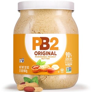PB2 Original Powdered Peanut Butter, 907g (32 oz), offers 90% less fat than traditional peanut butter, is gluten-free, non-GMO, and provides 6g of protein per serving.
