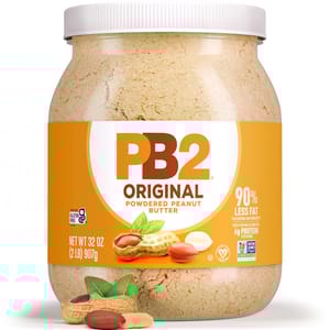 PB2 Original Powdered Peanut Butter, 907g (32 oz), offers 90% less fat than traditional peanut butter, is gluten-free, non-GMO, and provides 6g of protein per serving.
