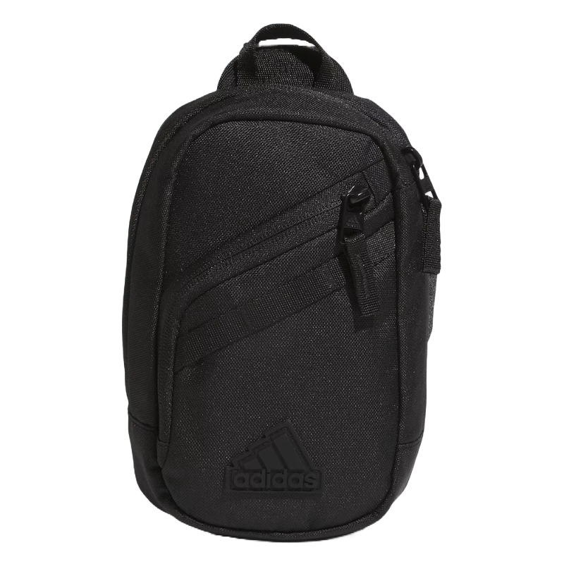 Black Adidas mini crossbody bag with a textured finish, featuring two zippered compartments and an adjustable strap. The Adidas logo is embossed on the lower front.