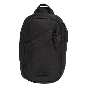 Black Adidas mini crossbody bag with a textured finish, featuring two zippered compartments and an adjustable strap. The Adidas logo is embossed on the lower front.