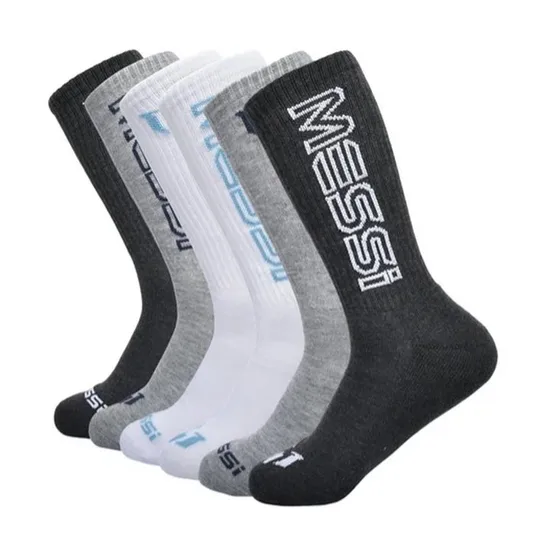 A set of five pairs of socks in varying shades of grey and white, each featuring the name \“Messi\“ on the sides.
