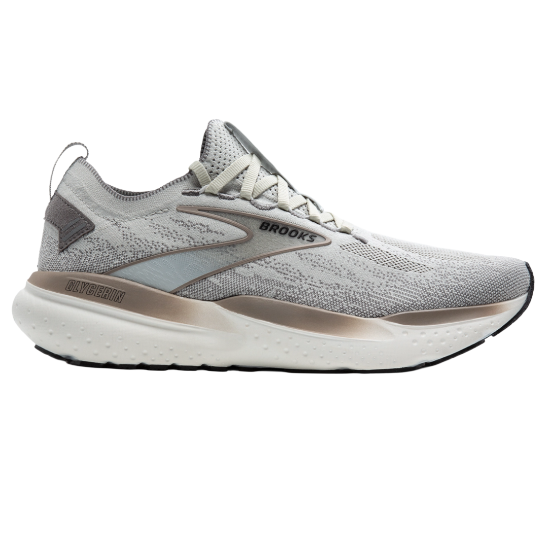 Brooks Glycerin running shoe in gray with a knit upper, cushioned sole, and subtle logo detailing.
