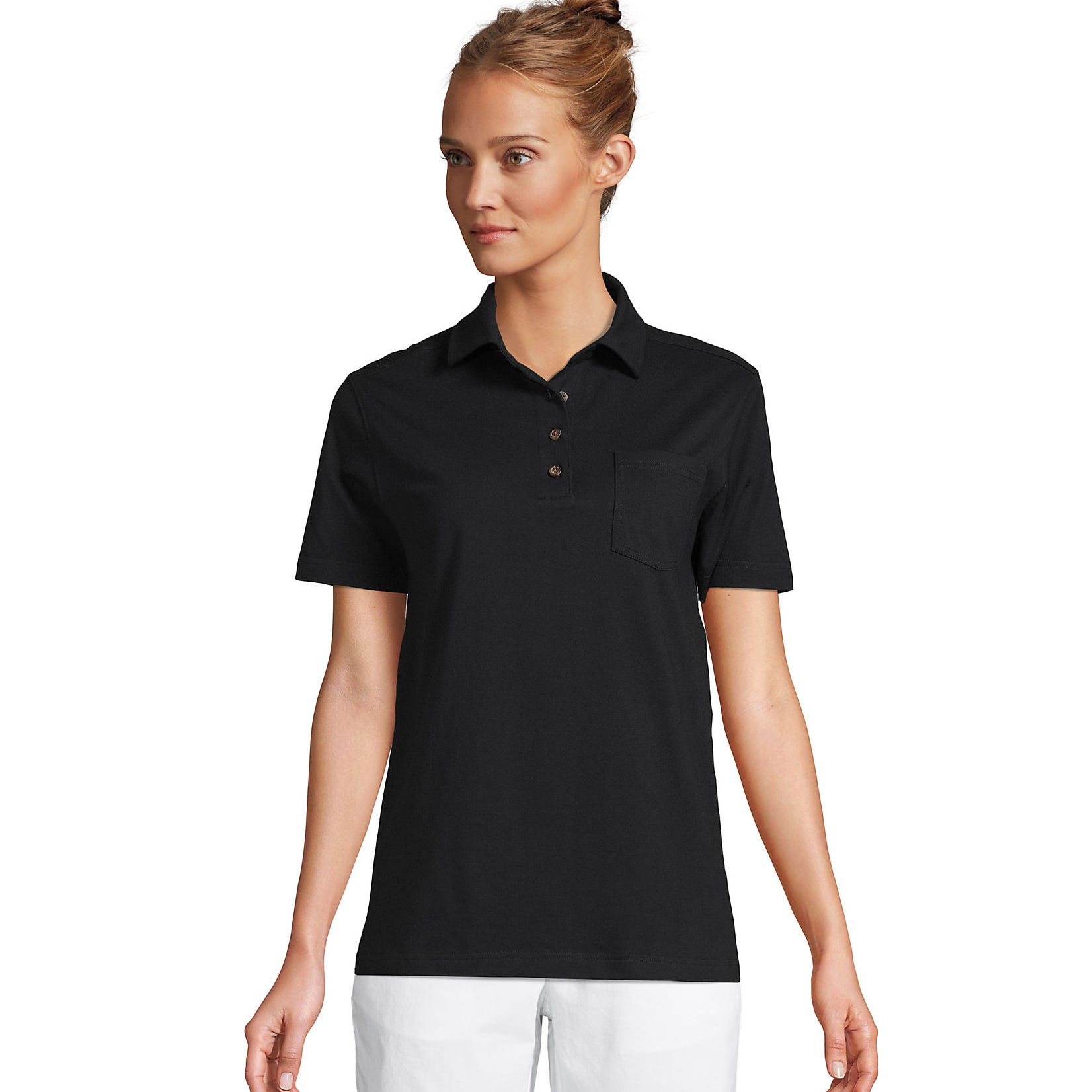 A woman wearing a black polo shirt with a collar, buttons, and a pocket on the left chest.
