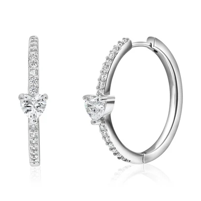 A pair of silver hoop earrings adorned with small sparkling stones and a central heart-shaped gem.
