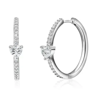 A pair of silver hoop earrings adorned with small sparkling stones and a central heart-shaped gem.