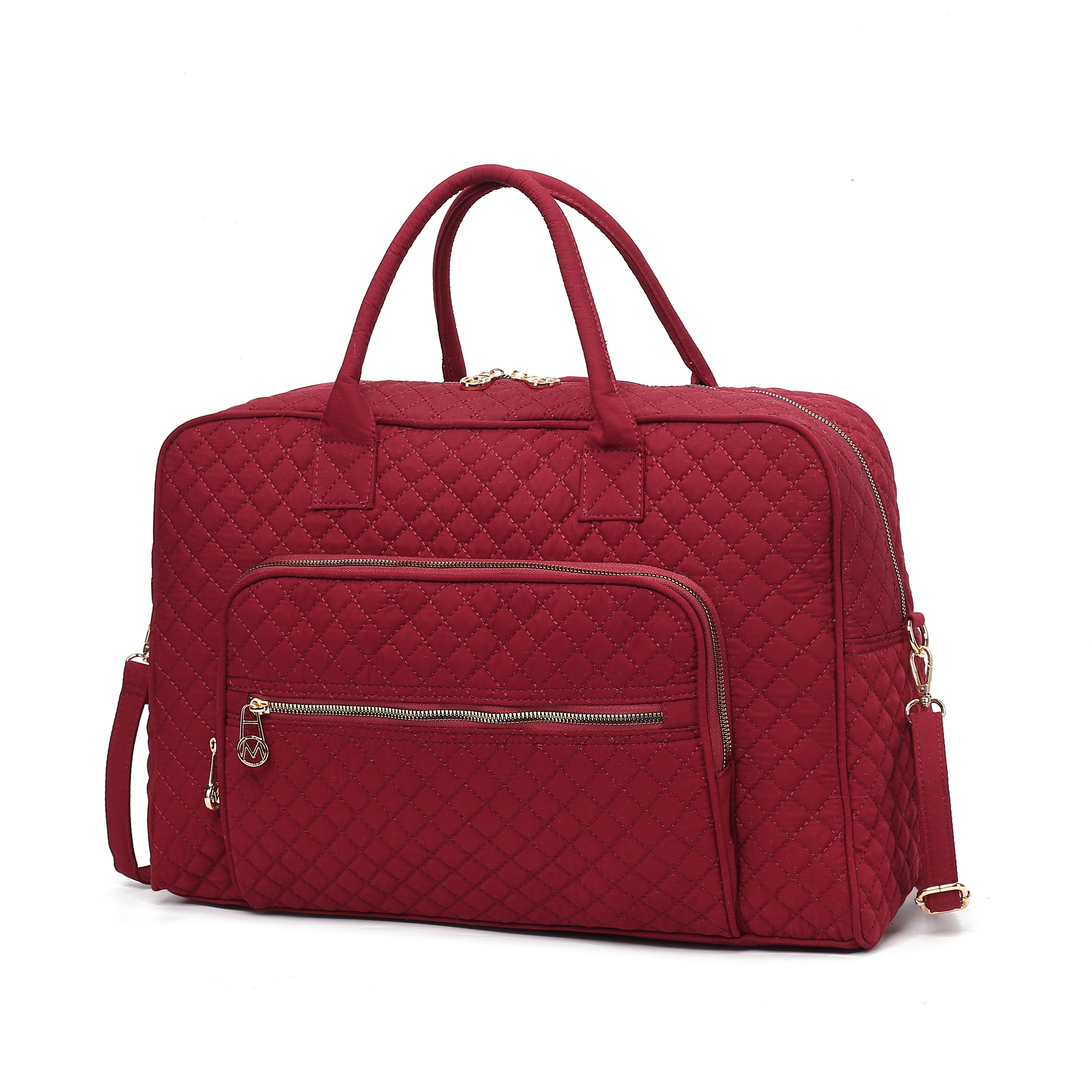 Red quilted duffel bag with top handles, a front zipper pocket, and a detachable shoulder strap.