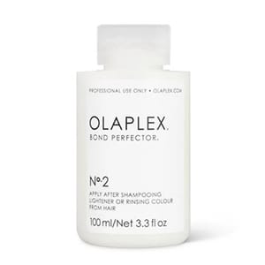 Olaplex No. 2 Bond Perfector is a hair treatment designed for professional use to strengthen and repair hair bonds. It should be applied after shampooing to help maintain the integrity of the hair.