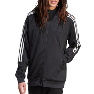 Black Adidas track jacket featuring white three-stripe detailing along the shoulders and sleeves, with \“Adidas\“ written on the left sleeve. It has a full zip closure and side pockets.