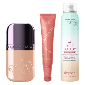 Urban Decay foundation, Tarte Blush Tape liquid blush, and Drybar Hot Toddy heat protectant mist.