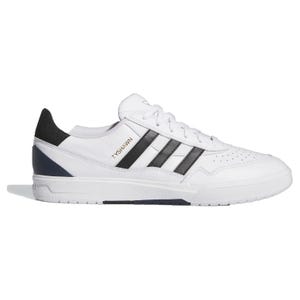 Adidas Tyshawn II shoes are white with black stripes, featuring \“TYSHAWN\“ in gold lettering on the side. They have a low profile design with a black heel accent and a perforated toe for breathability.