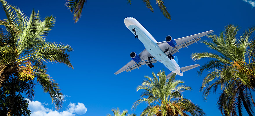 Avoid baggage fees and travel surcharges for holiday travel this year.