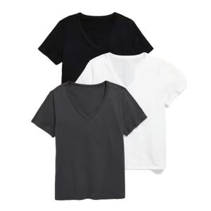 A set of three V-neck T-shirts in black, white, and dark gray.