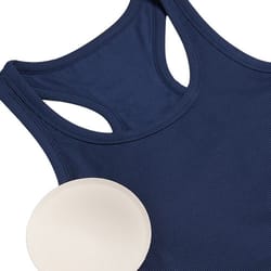 A navy blue tank top with a racerback design and a removable round beige pad.