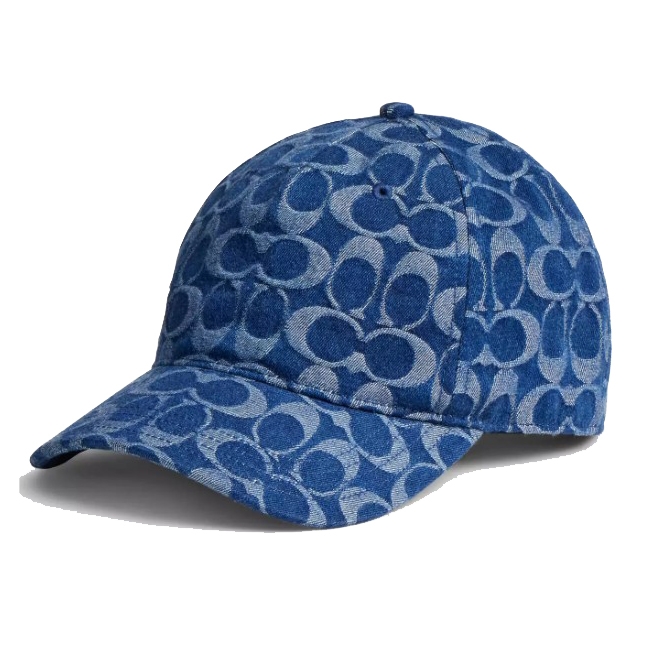 This is a blue denim baseball hat featuring the Coach signature pattern, with a curved brim and button on top. The pattern consists of overlapping 'C' shapes creating a distinctive, textured look.