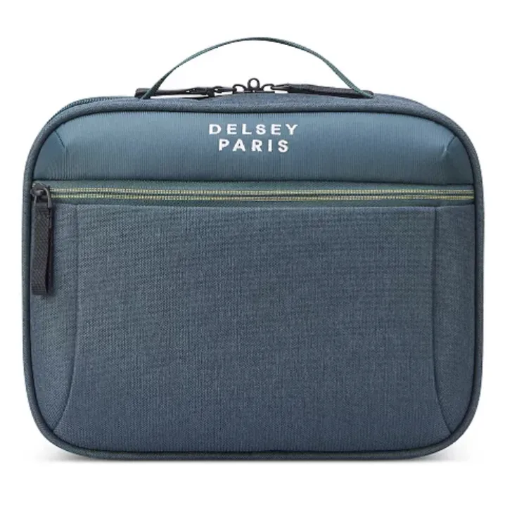 A compact Delsey Paris travel bag in blue with a top handle and front zippered pocket.