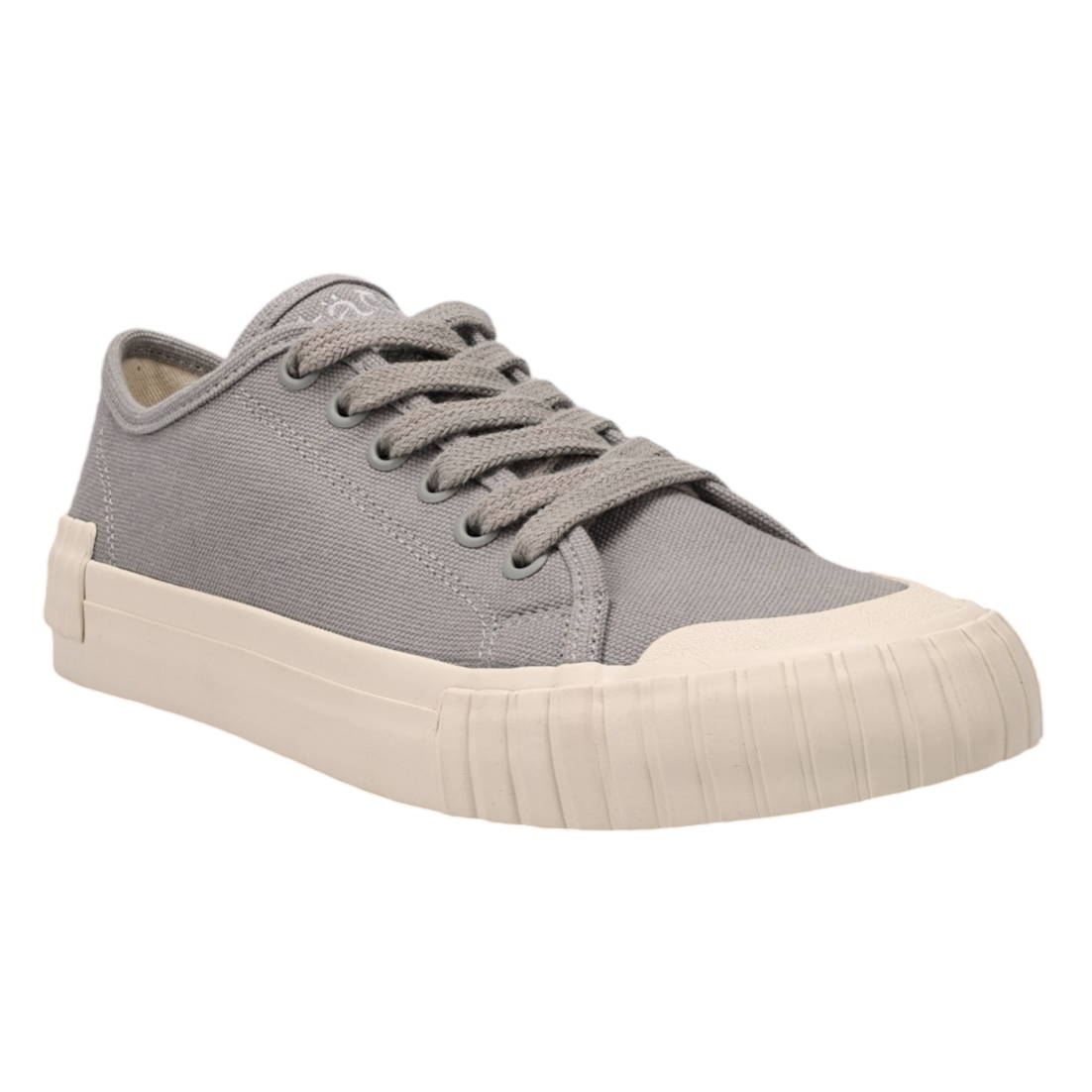 Gray low-top sneaker with a textured rubber sole and reinforced toe cap, featuring cotton laces and metal eyelets.