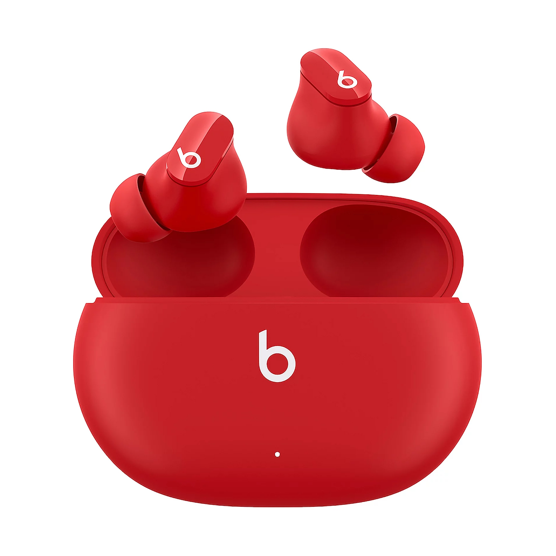 Red wireless earbuds with a charging case featuring the Beats logo.