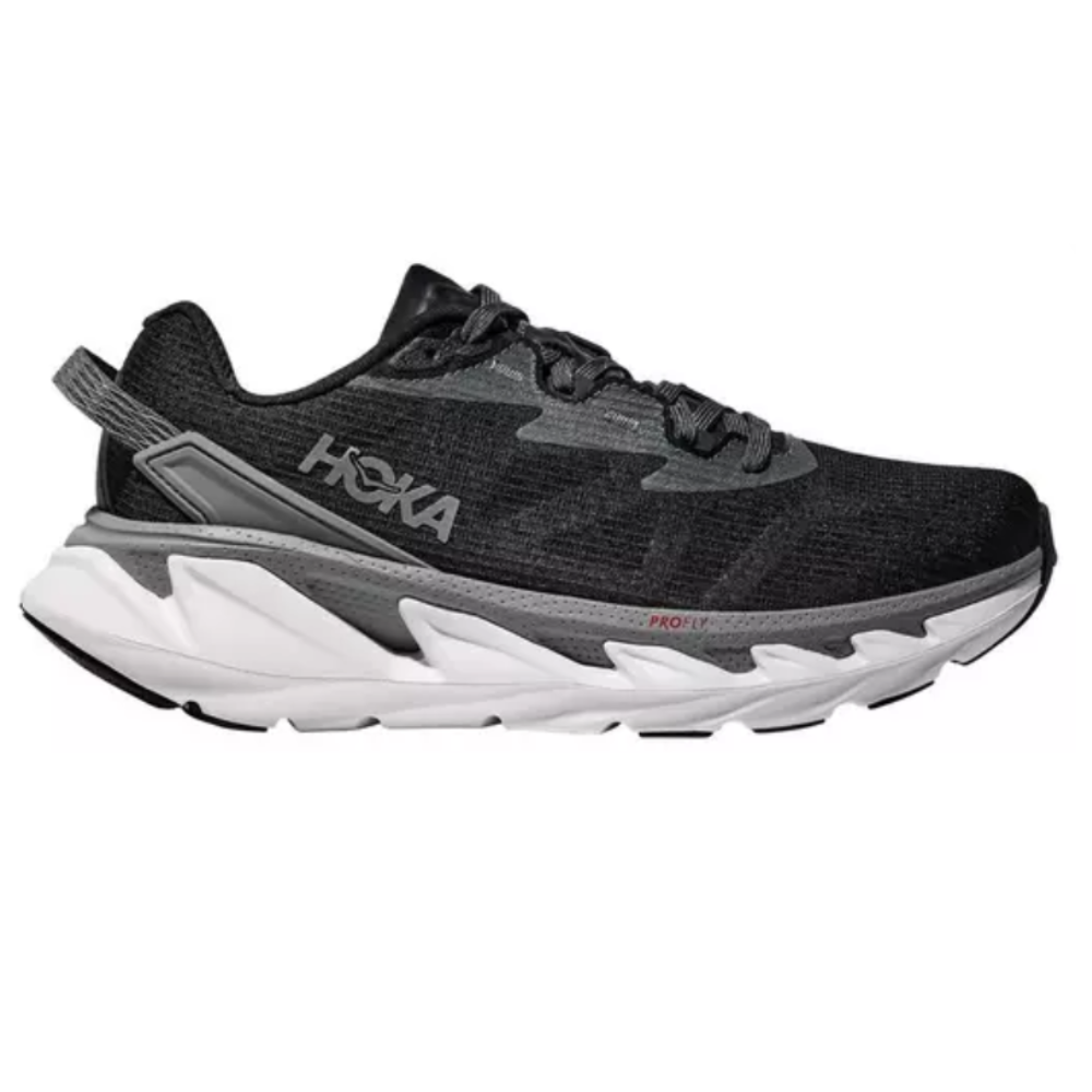 Hoka running shoe in black and gray featuring a thick, white midsole with \“PROFLY\“ technology.