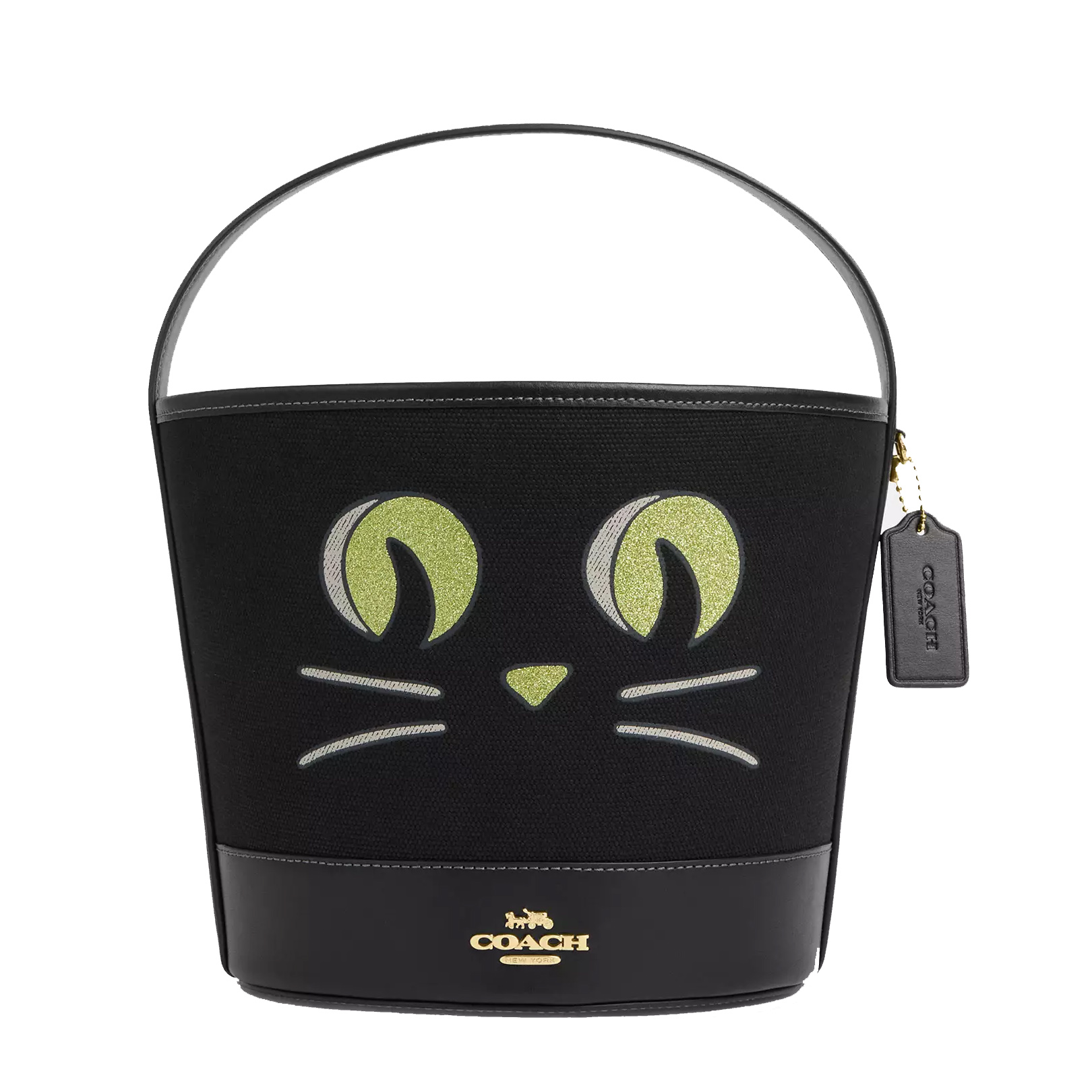 Black Coach bucket bag with a cat face design and a hanging brand tag.