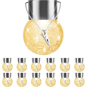12-pack of hanging solar-powered LED crackle glass globe lights with metal tops, emitting a warm white glow. Includes clips for easy attachment. Suitable for outdoor use.