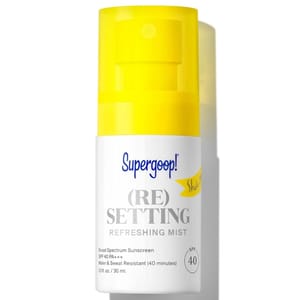 Supergoop! (Re)setting Refreshing Mist is a broad spectrum sunscreen with SPF 40, offering water and sweat resistance for 40 minutes, in a 30 ml spray bottle.