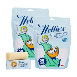 Two 726g bags of Nellie's Laundry Soda, each for 50 loads, accompanied by a Wow Stick Stain Remover. The packaging features a vintage-style illustration of a woman holding a laundry basket.