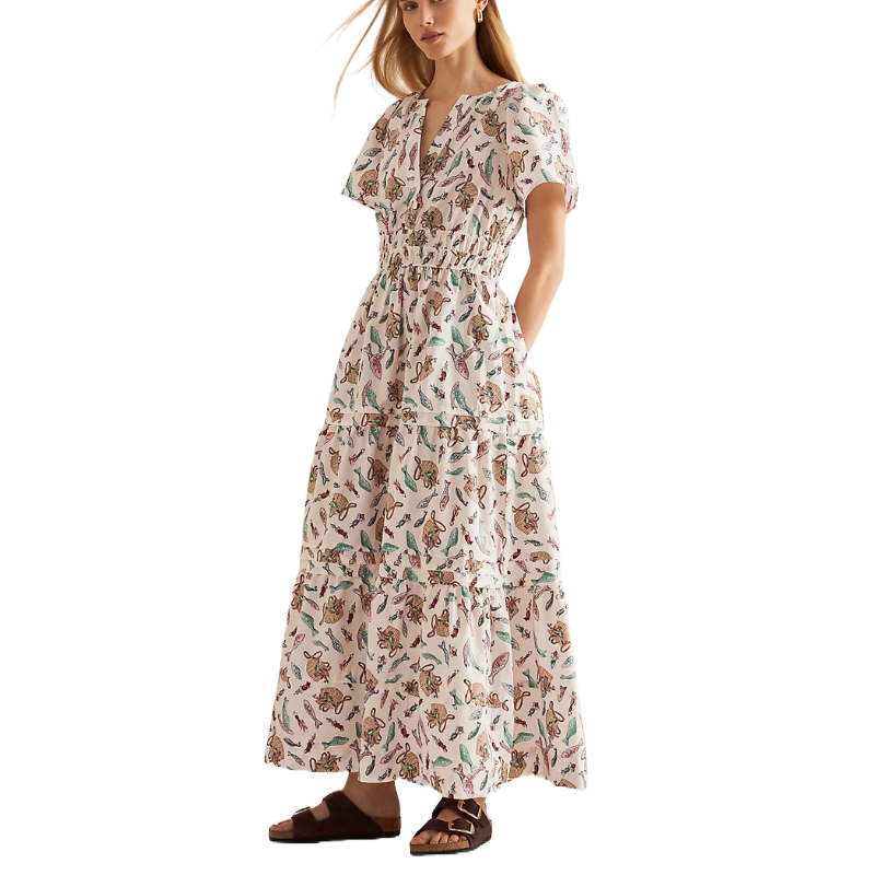 A V-neck tiered maxi dress with a short-sleeved design and an elastic waist, featuring a pattern of colorful butterflies on a light background, paired with brown sandals.