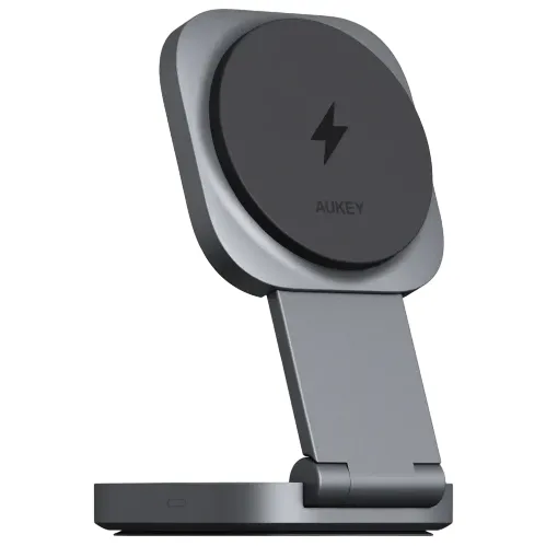 A foldable wireless charging stand featuring a circular charging pad with a lightning bolt symbol, branded with \“AUKEY\“, supported by a hinged arm on a rectangular base.