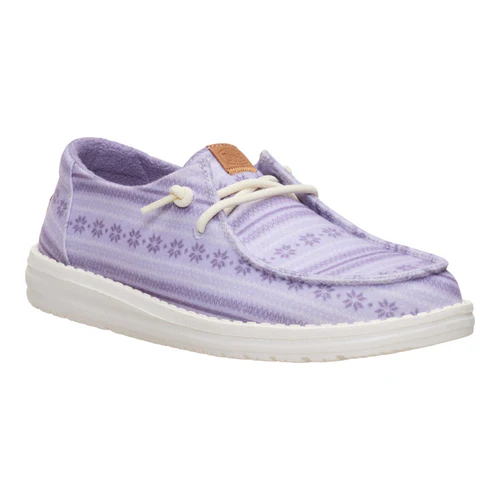 A lavender casual shoe with a white sole, featuring subtle floral patterns and white laces.