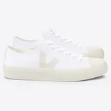 White low-top sneakers with a minimalist design, featuring a subtle logo on the side and cream-colored soles.