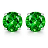 Pair of round-cut green gemstone stud earrings with silver prongs.