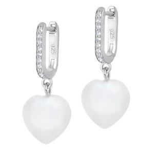 A pair of silver hoop earrings featuring a line of small crystals and a dangling heart-shaped white shell pearl. The hoops are marked with \“925,\“ indicating sterling silver.